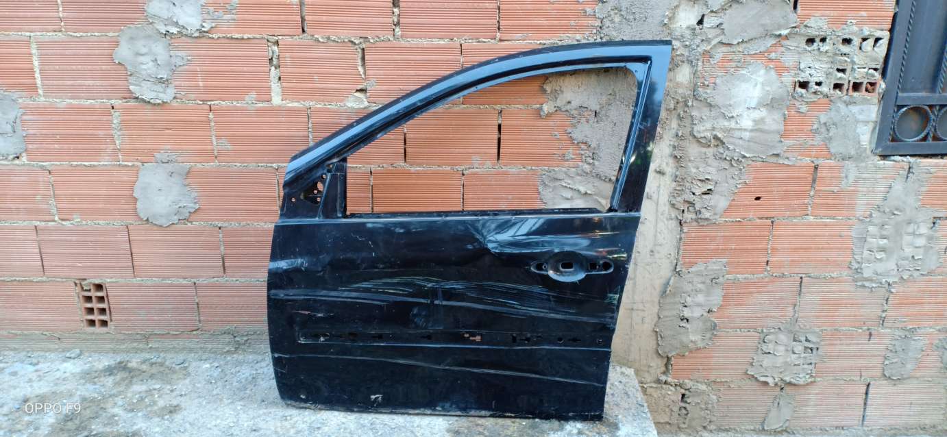 Porte avant gauche (chauffeur) Clio 3